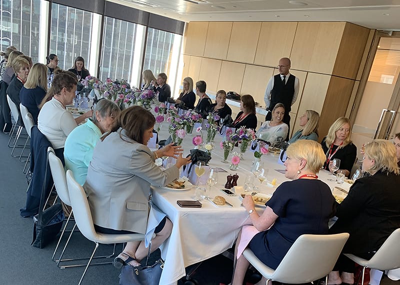 2019 IWD Luncheon guests seated at table
